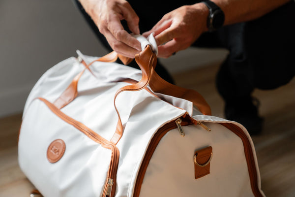 Why the Caribbean Convertible Duffle in White Is the Most Versatile Bag Drop of 2025