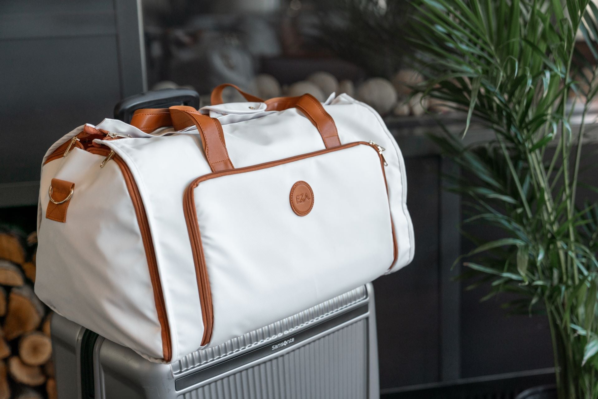 Stylish convertible duffle bag on suitcase, showcasing its versatile design as a lightweight travel bag.