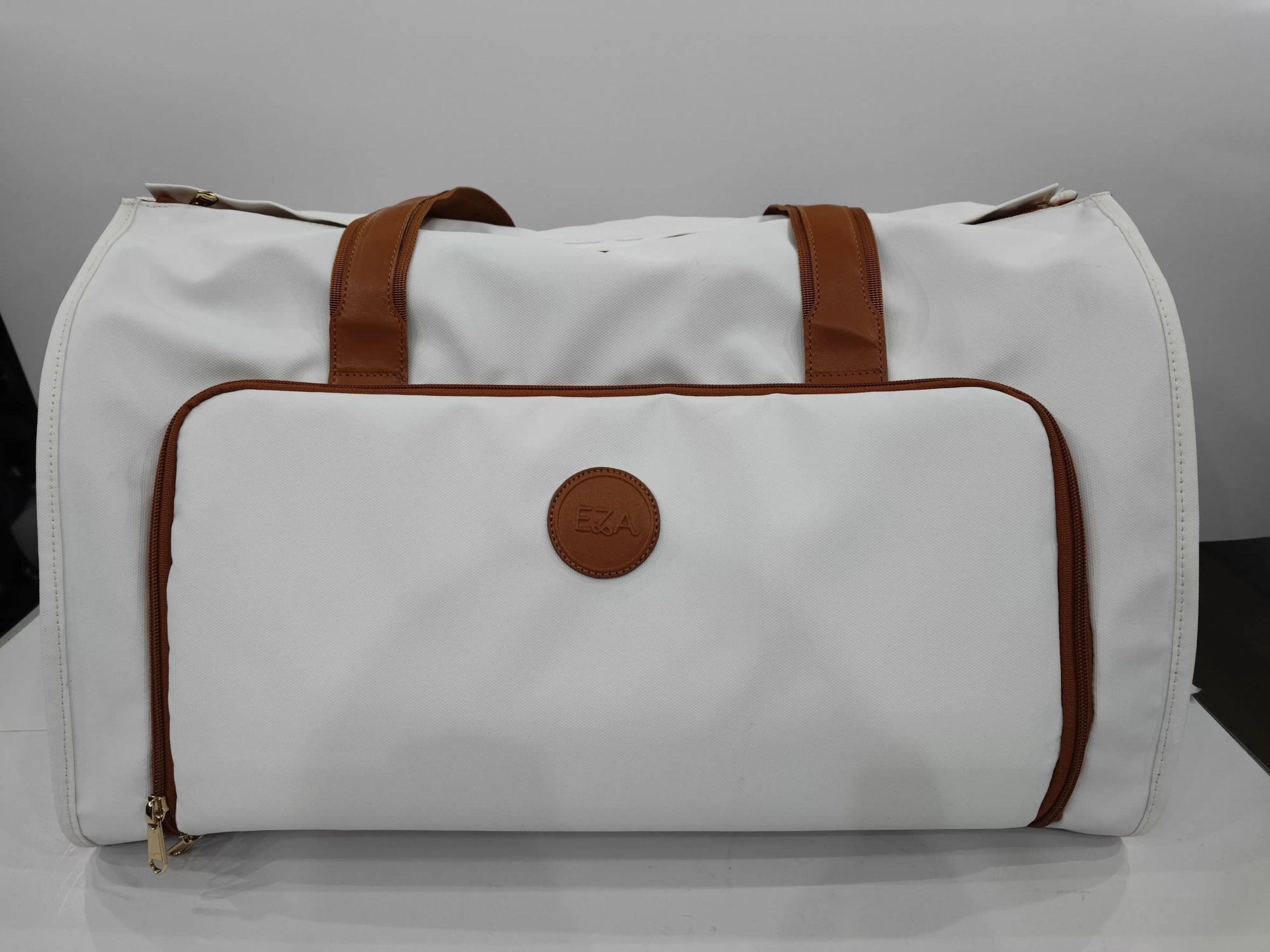 White Caribbean Convertible Duffel bag with brown straps, a versatile 3-in-1 lightweight travel bag for any adventure.